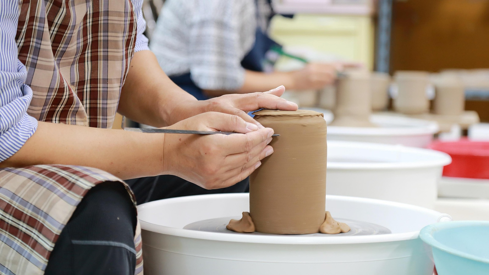 An artist working clay